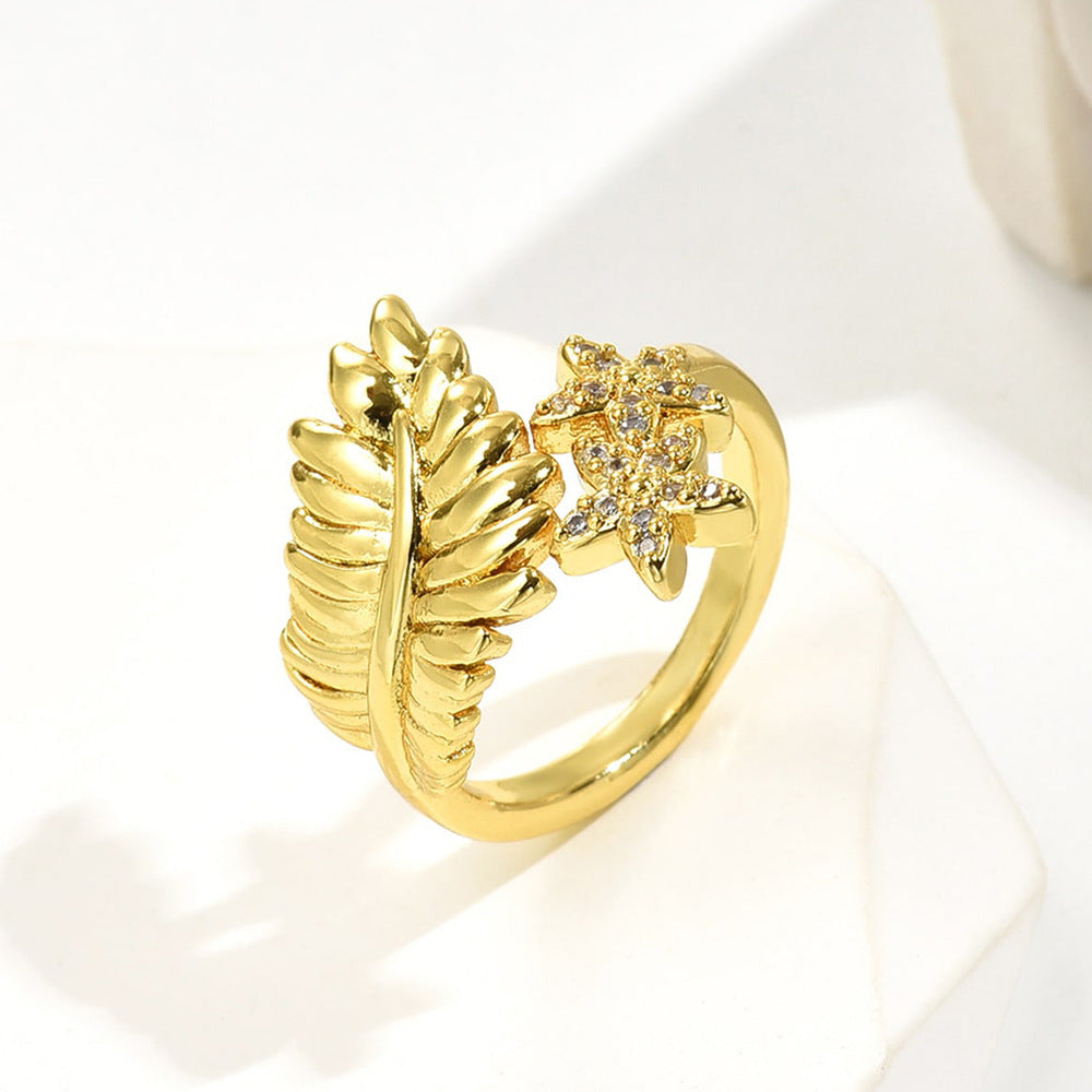 Anello da donna a forma di fiore a foglia geometrica in rame con placcatura in oro 18 carati e zirconi micro-pavé