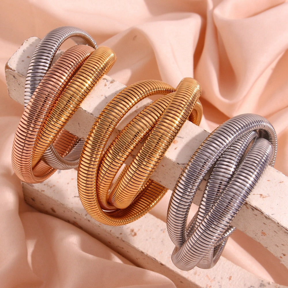 Minimalist Titanium Steel Bracelet with 18K Gold Plated Triple-Wrap Elastic Snake Chain for Women