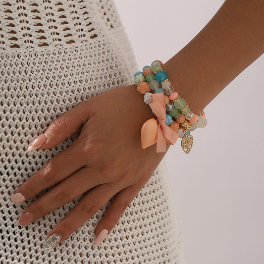 Set di bracciali multistrato "Dolce Cuore Bohemien" con ciondolo e fiocco in resina plastica