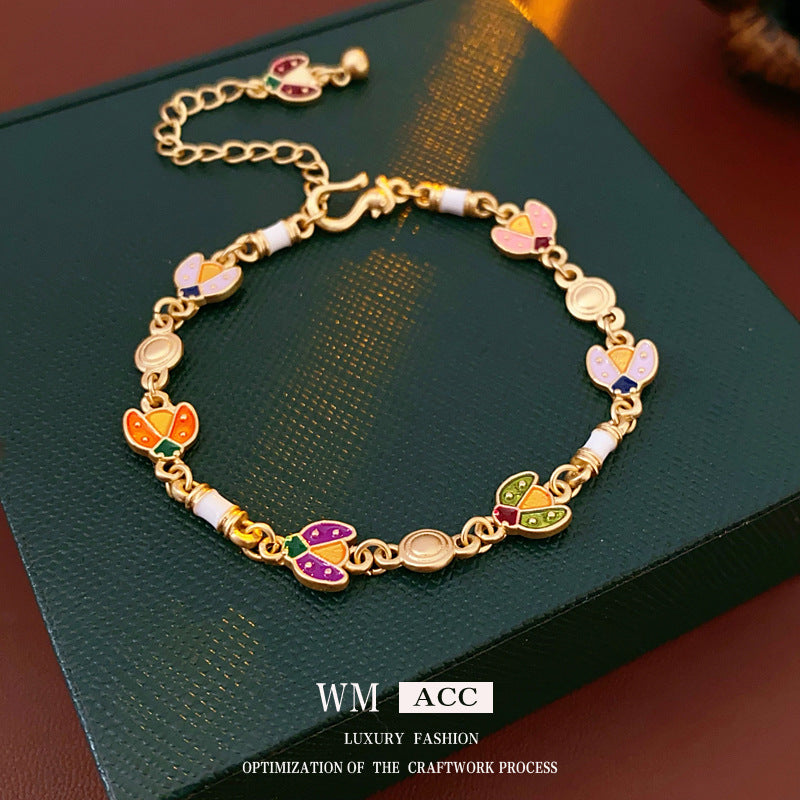 Bracciale vintage da donna con motivo floreale geometrico in lega e smalto, elegante gioiello di lusso
