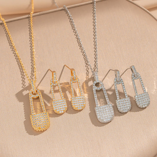 Set di collana e orecchini in acciaio al titanio con zirconi a forma di graffetta minimalista da donna