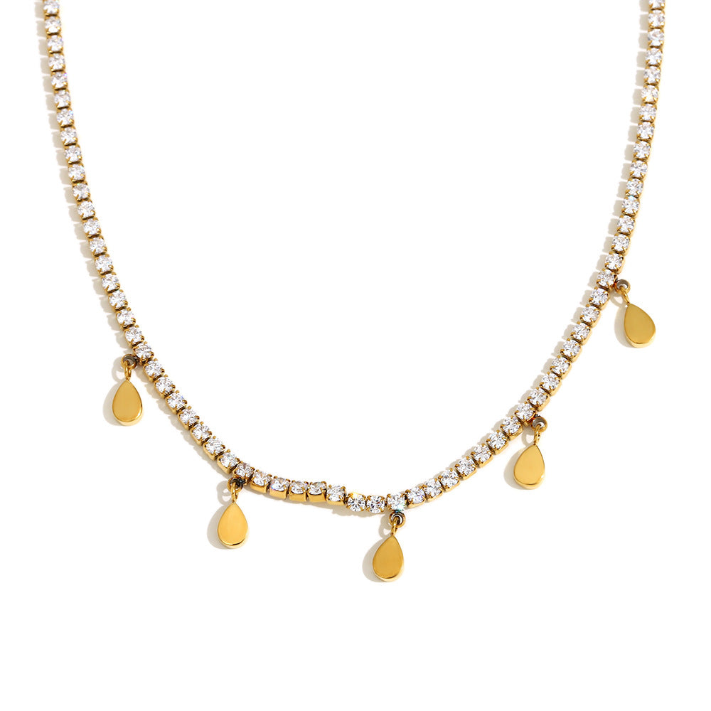 Set collana e bracciale pendente a croce a goccia minimalista in acciaio inossidabile con placcatura in oro 18 carati e accenti di zircone da donna