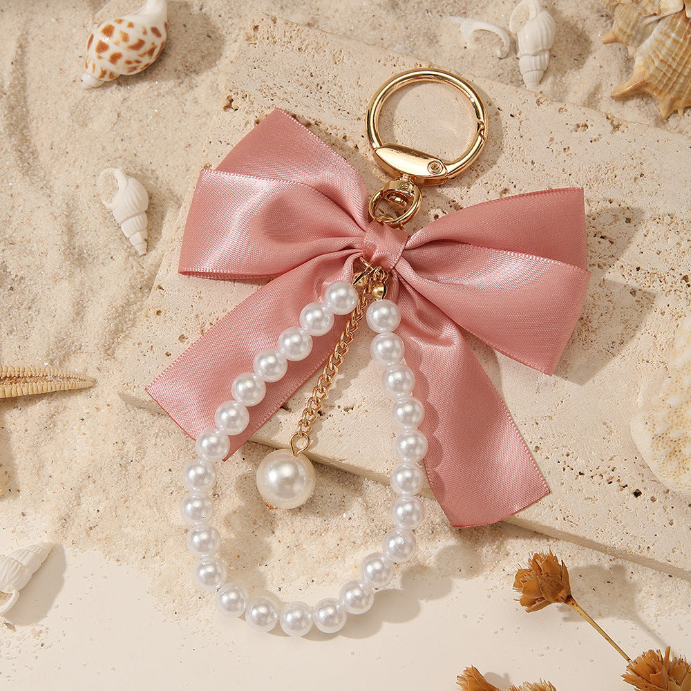 Sweet Cartoon Bow Pearl Zinc Alloy Keychain Bag Charm