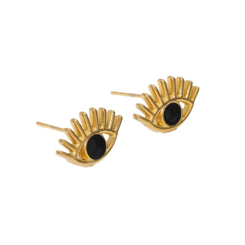 Pendientes de botón con forma de ojo de demonio atrevido de acero de titanio con chapado en oro de 18 quilates para mujer