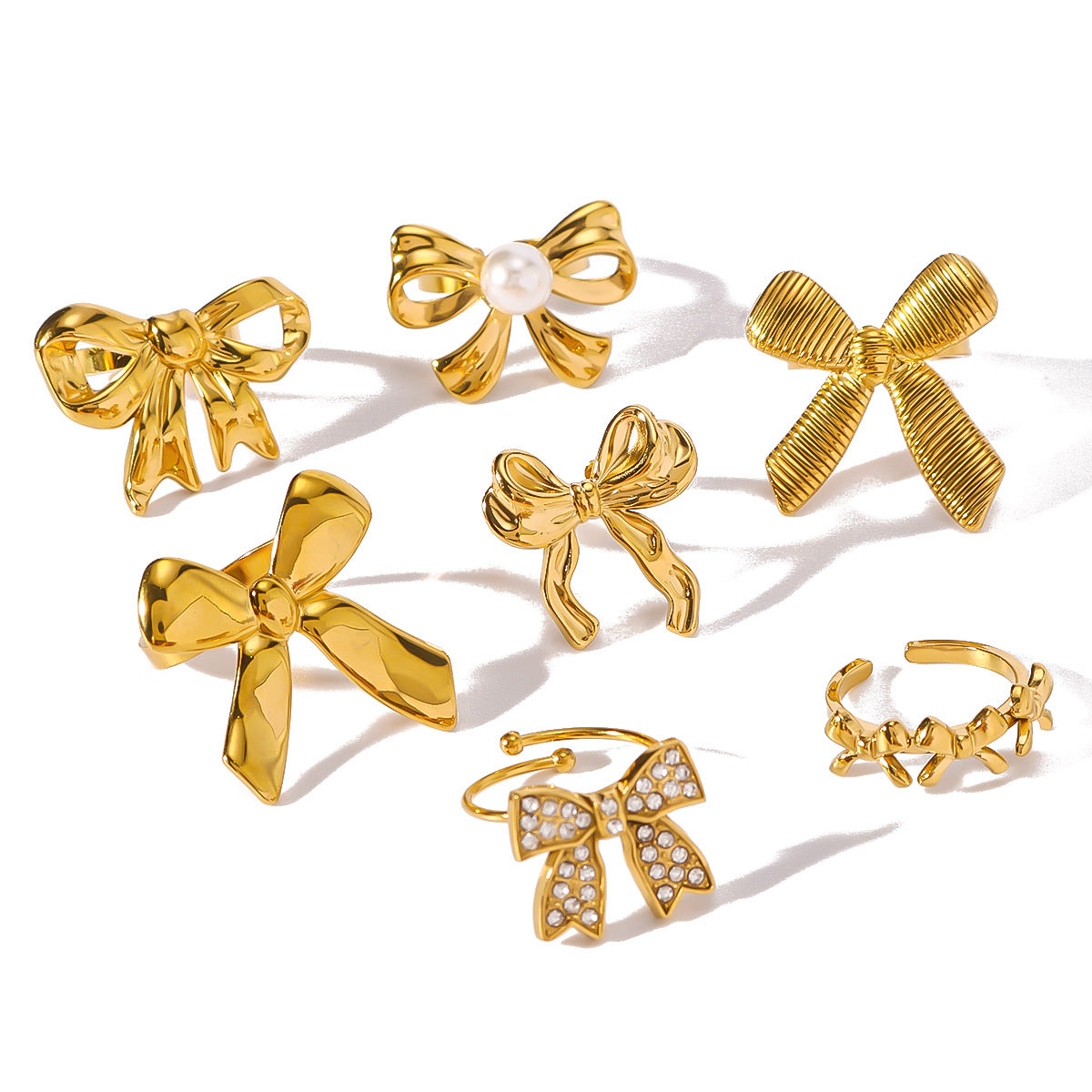 Minimalist Bow-Shaped Stainless Steel Ring with Pearl and Zircon Inlay, Vacuum Plated in 18K Gold Finish, Unisex Fashion Jewelry