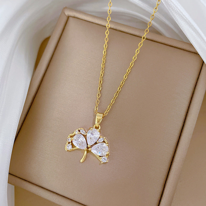 Elegant Ginkgo Leaf Pendant Necklace in Titanium Steel with Full Rhinestone Inlay for Women, Delicate Clavicle Chain with Geometric and Natural Design