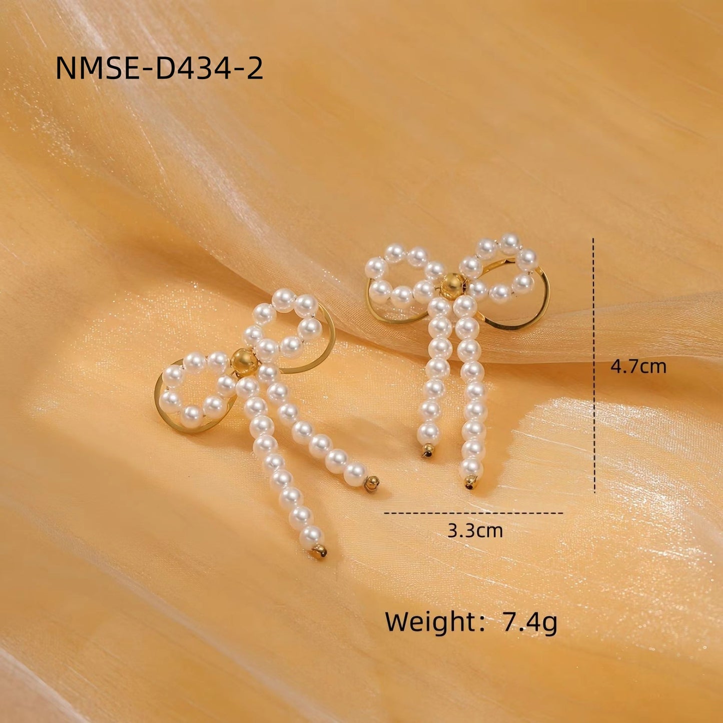Orecchini da donna minimalisti con fiocco in perle e acciaio al titanio, con finitura placcata e design a forma di cuore