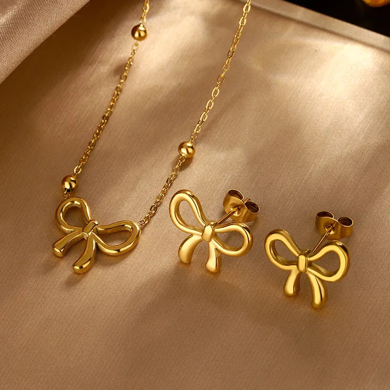 Elegante Parure di Collana e Orecchini con Fiocco in Acciaio Inossidabile Placcato Oro 18K da Donna