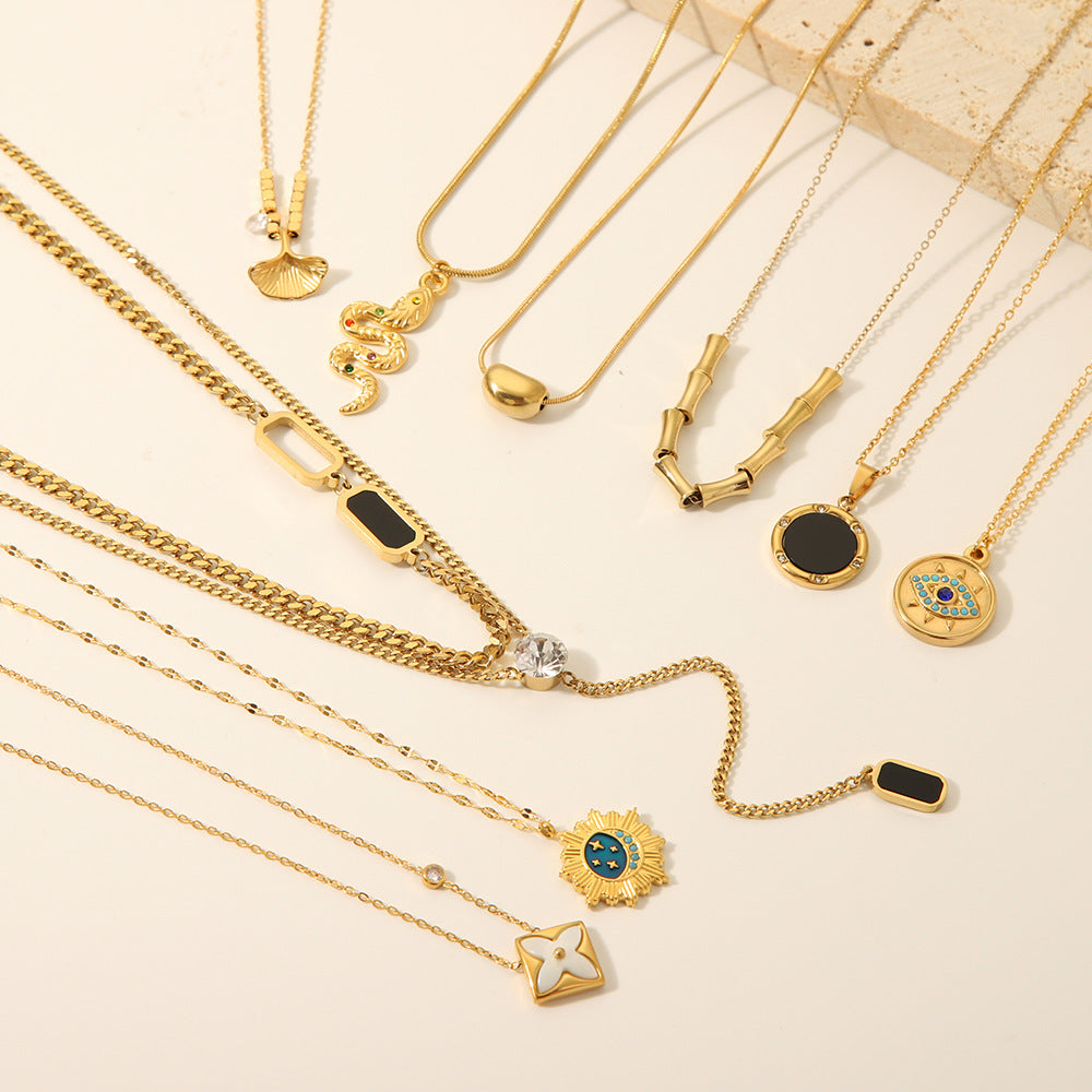 Minimalist Stainless Steel Snake-Eye Bamboo-Shaped Pendant Necklace for Women with 18K Gold Plating and Zircon Inlay