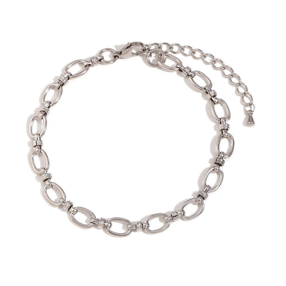 Tobillera geométrica minimalista de acero inoxidable con baño de oro de 14 quilates y cierre de cruz para mujer