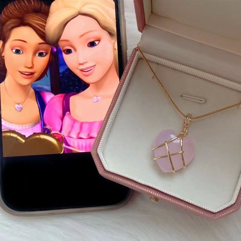 Elegante collar de latón y acero inoxidable chapado en oro con forma de corazón geométrico de dibujos animados con incrustaciones de circonita cúbica para mujer