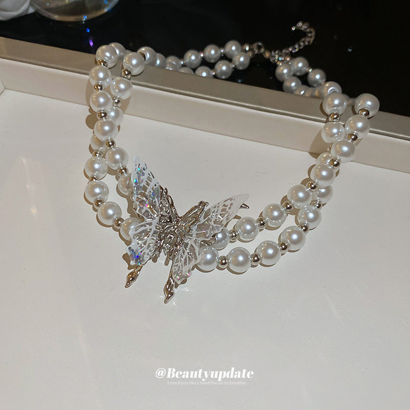 Elegante collar de mariposa de doble capa estilo francés con imitación de perla y colgante de cristal para mujer, cadena de clavícula