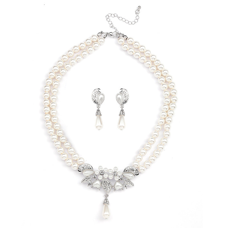 Set di collana e orecchini floreali ispirati a Chanel per donna con lega placcata oro, catena di perline e motivi botanici tra cui grano, petali, foglie e silhouette di alberi