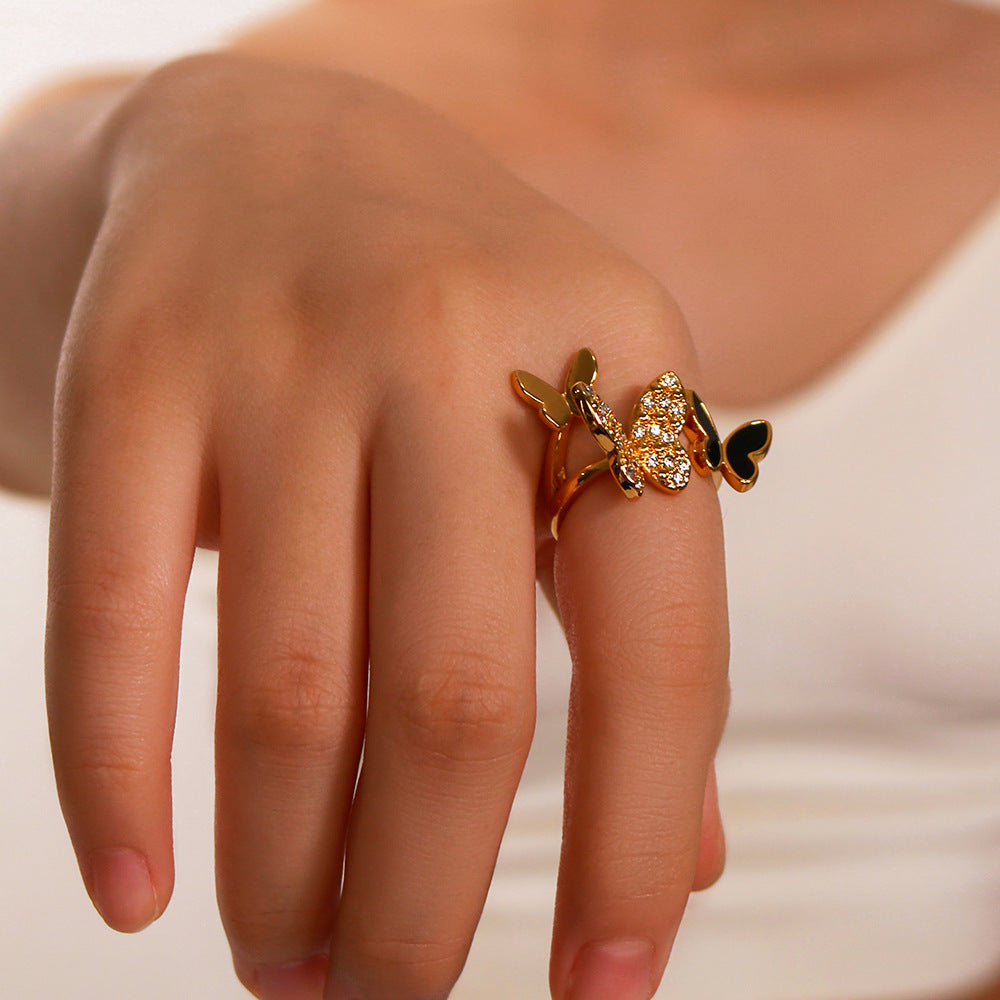 Anello regolabile a farfalla in acciaio inossidabile con intarsio in strass e finitura smaltata da donna