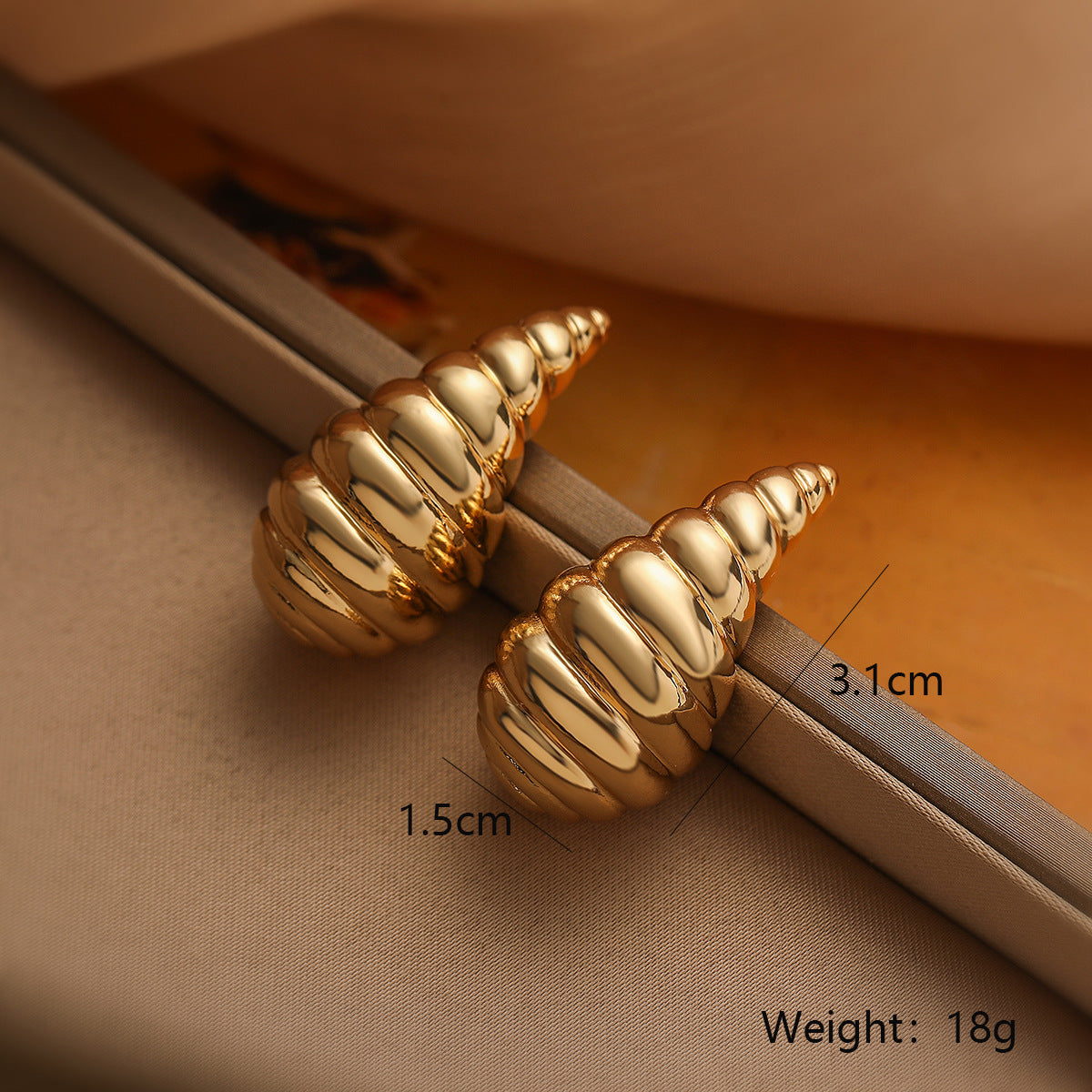 Minimalist Spiral Teardrop Earrings for Women in Copper with Gold Plating and Micro-Pave Setting