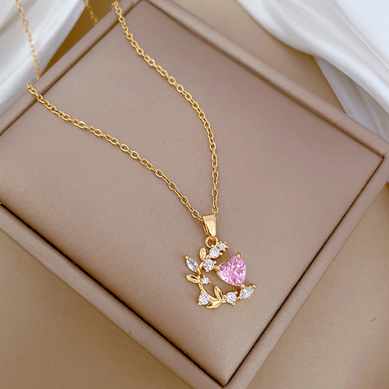 Collana con catena a collare elegante di lusso in acciaio al titanio con zircone a foglia di cuore per unisex