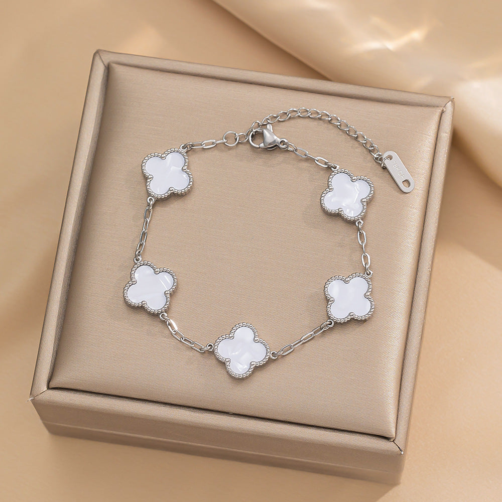 Set di collana, bracciale e orecchini a lobo da donna in acciaio al titanio minimalista con quadrifoglio fortunato