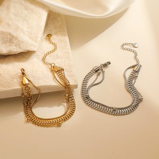 Bracciale Minimalista Geometrico in Acciaio al Titanio per Donna con Placcatura in Oro Design Irregolare di Ispirazione Vintage