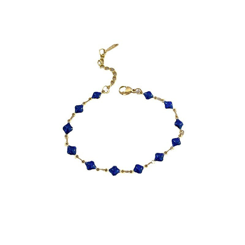 Minimalist Lucky Clover Blue Titanium Steel Bracelet for Women with Gold Plating and Wavy Texture