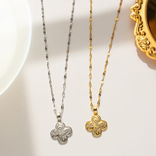 Luxury Minimalist Four-Leaf Clover Pendant Necklace for Women in Titanium Steel with Rhinestone Inlay on Wavy Chain