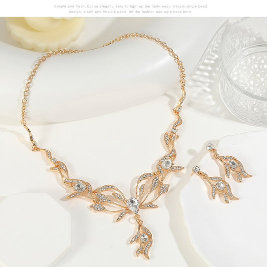 Conjunto de collar con colgante de hoja floral de diseño original con cadena de serpiente de aleación y pendientes a juego para mujer