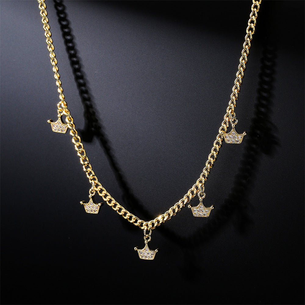 Collana con ciondolo geometrico in rame con placcatura in vero oro e intarsio di zirconi