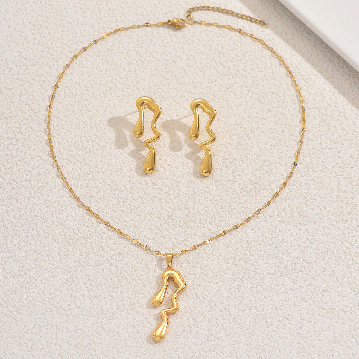 Set di collana e orecchini a pendente a cuore geometrico in lega con finitura placcata per donna