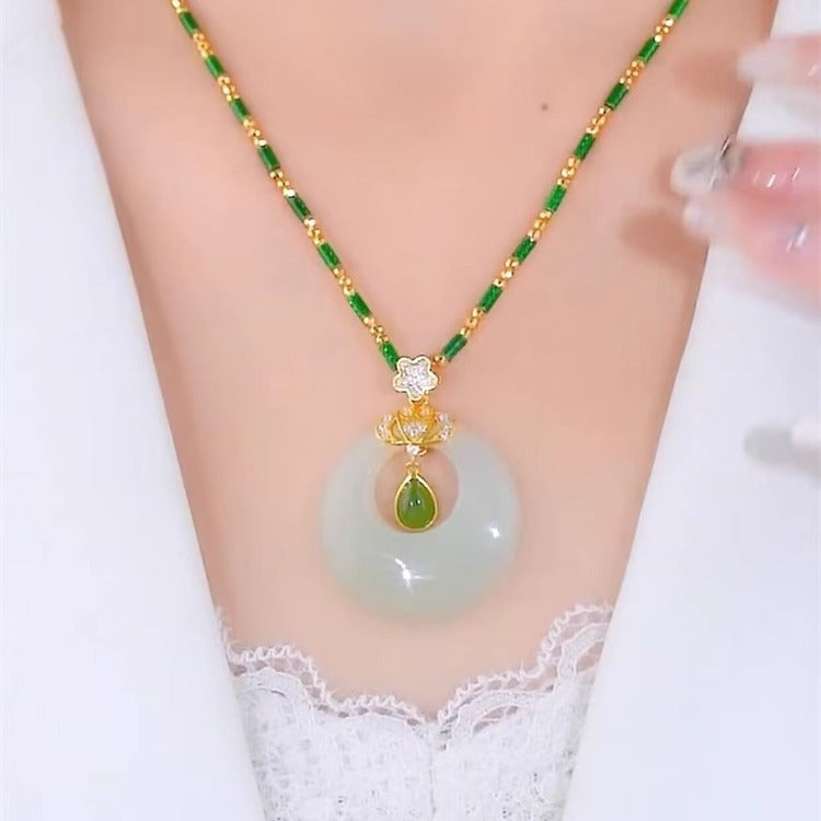 Collana a Forma di Goccia d'Acqua dal Design Originale in Acciaio al Titanio con Ciondolo in Rame Placcato Oro e Catena a O per Donne e Uomini