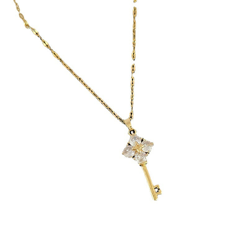 Geometric Key Pendant Necklace for Women in Titanium Steel with Gold Plating and Fringe Detail