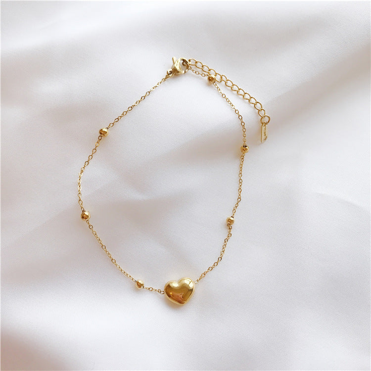 Cavigliera Minimalista a Cuore in Acciaio al Titanio Placcato Oro 18K da Donna