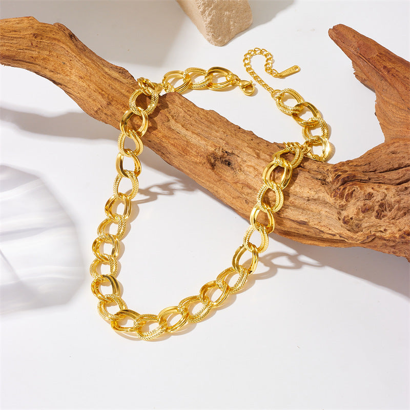 Collana da donna alla moda in acciaio al titanio placcato oro con doppio anello liscio e filettato