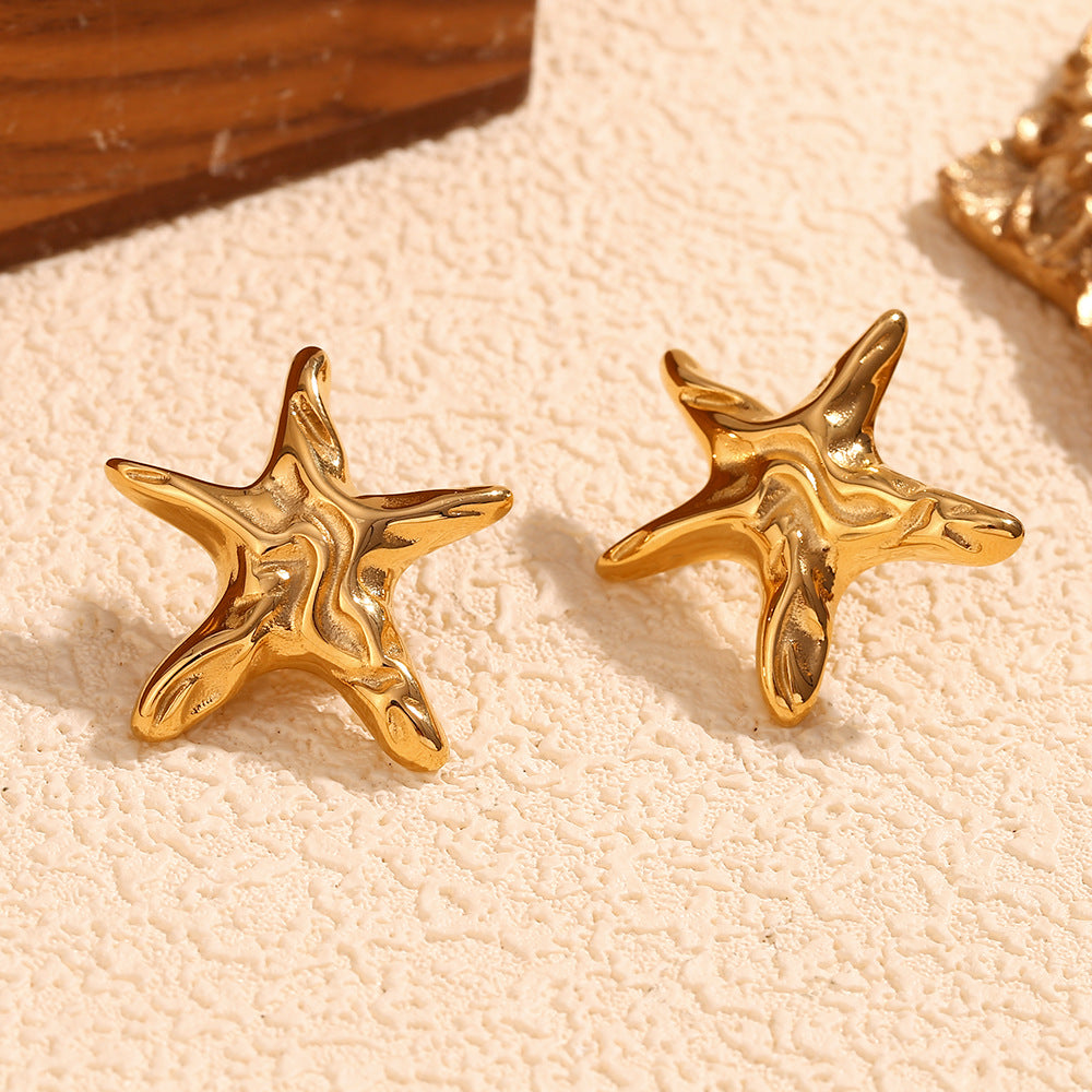 Orecchini a perno da donna a forma di stella in acciaio inossidabile, ispirazione vintage con texture irregolare