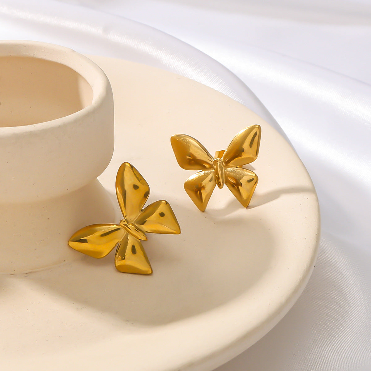 Minimalist Bowknot Titanium Steel Earrings with 18K Vacuum Plating for Women