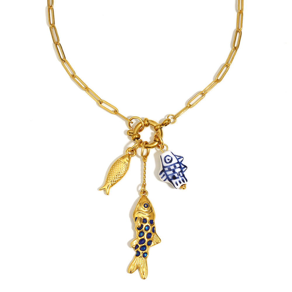 Collana con ciondolo a forma di pesce geometrico, stile lusso leggero, placcata oro 18 carati, chiusura a molla in acciaio inossidabile da donna