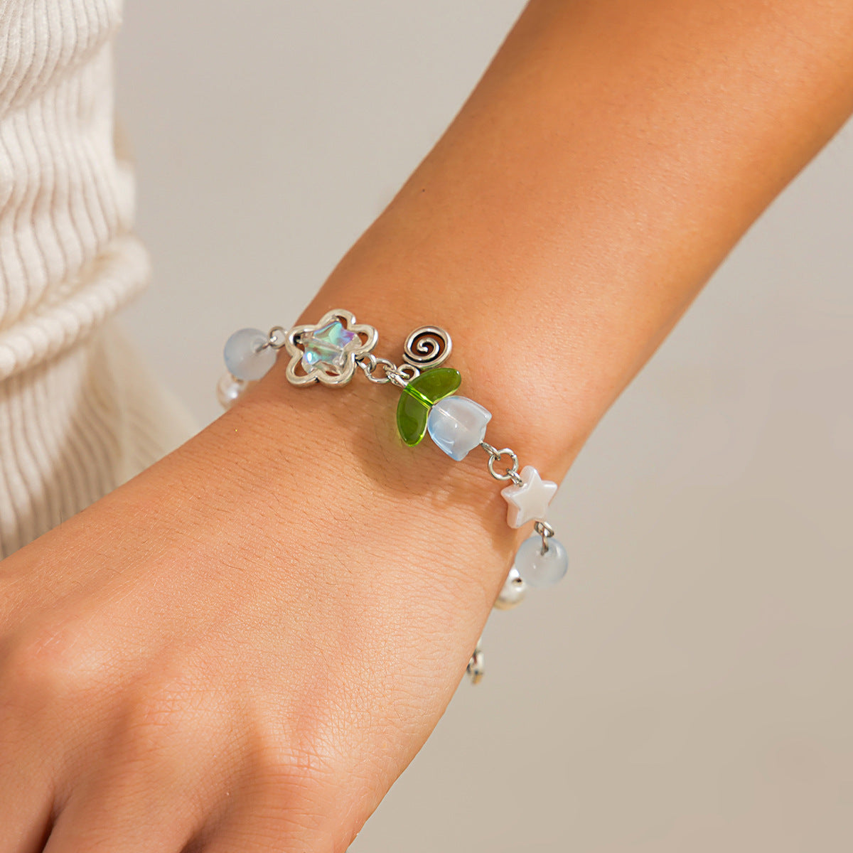 Sweet Floral Alloy Plated Bracelet with Acrylic Strawberry Pearl Tassel