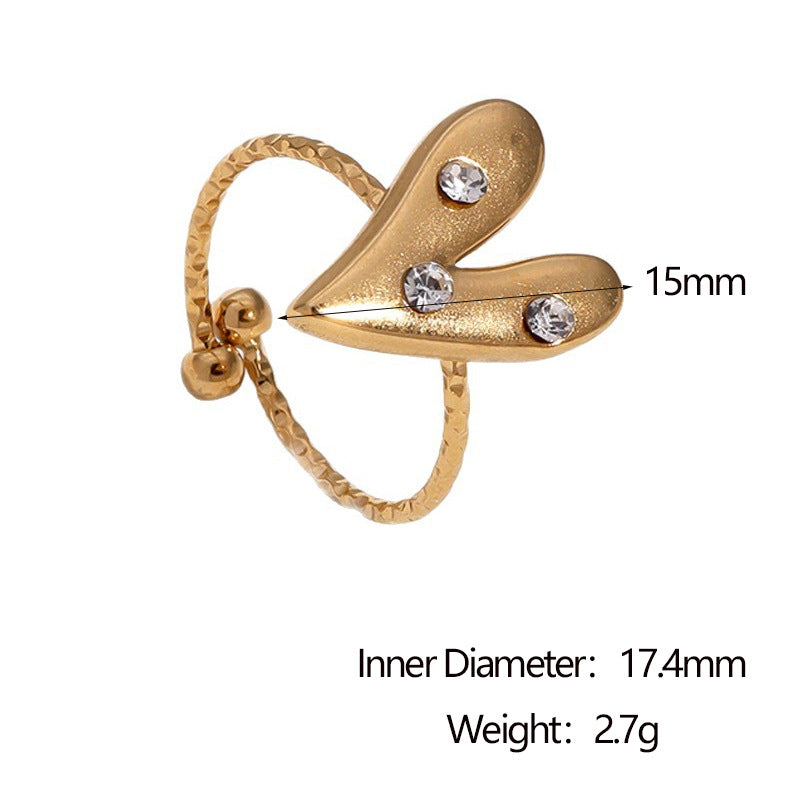 Anello da donna minimalista a forma di cuore in acciaio al titanio con placcatura in oro 18 carati e intarsio di strass