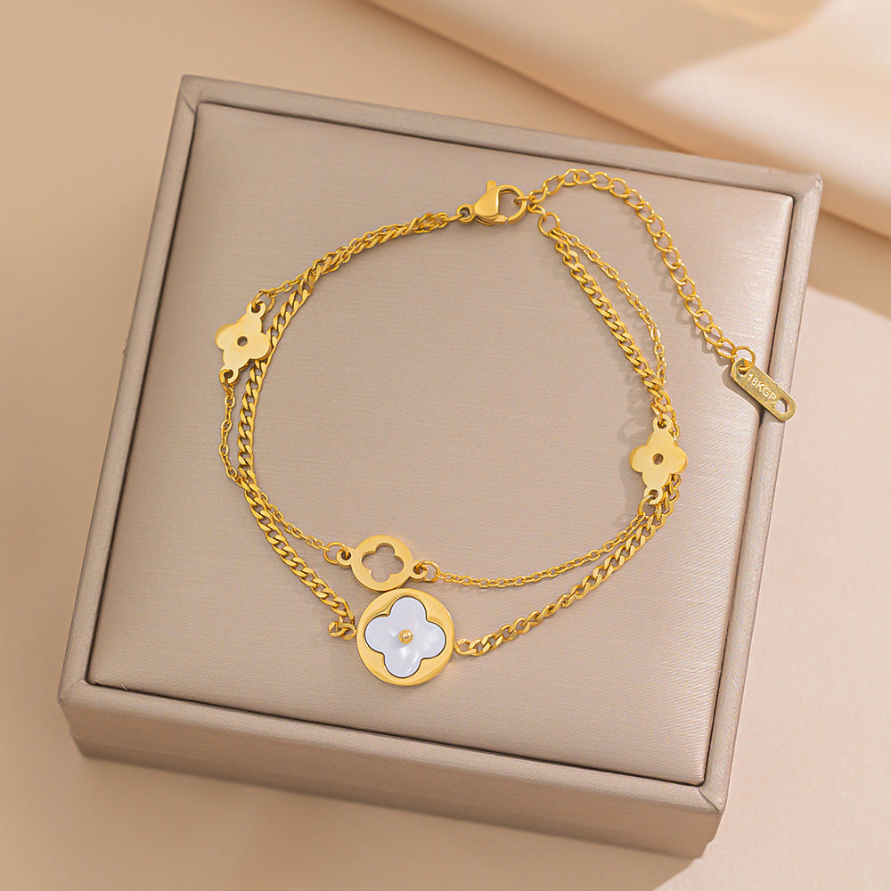 Minimalist Clover-Shaped Titanium Steel Bracelet with Hollow-Out Design and Hypoallergenic Electroplated Finish
