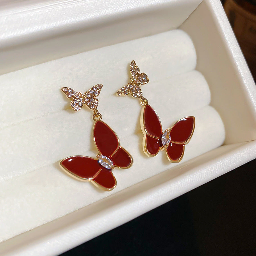 Elegantes pendientes de tuerca con forma de mariposa de estilo francés para mujer con base de cobre chapado, incrustaciones de diamantes de imitación y acabado esmaltado