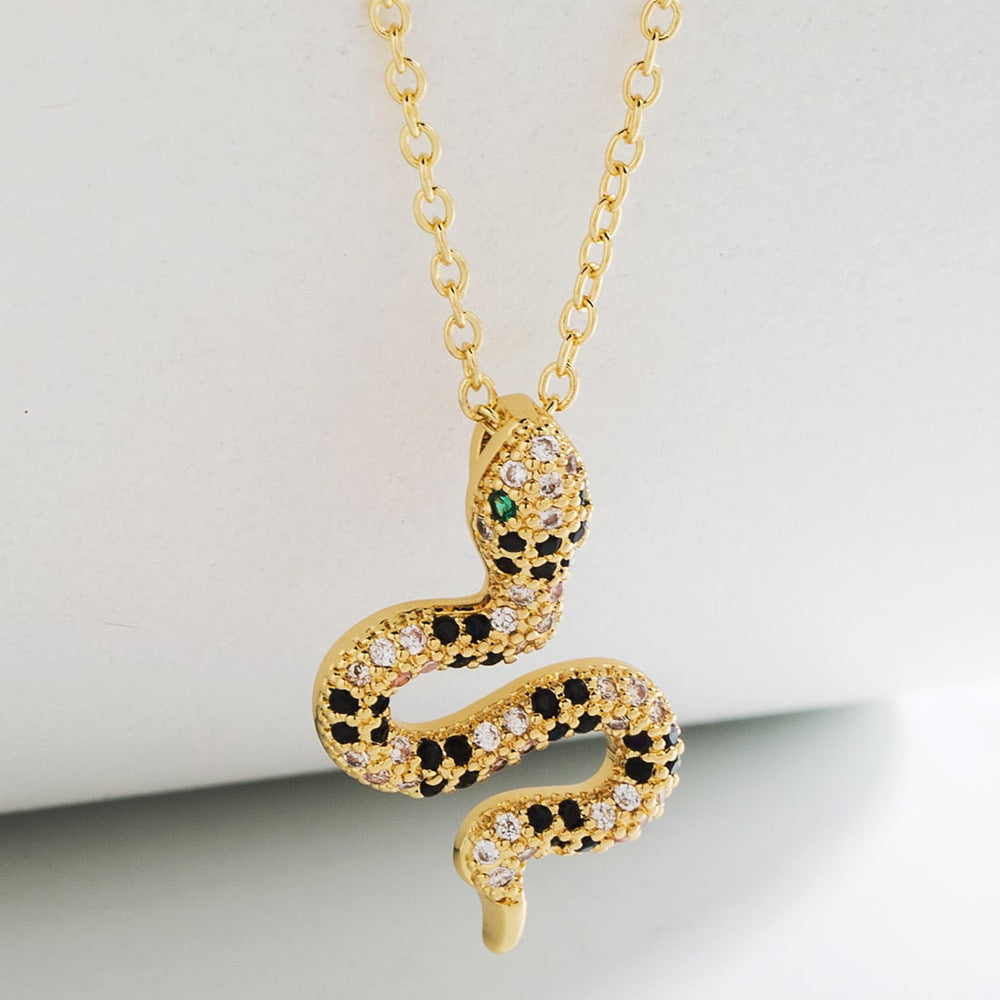 Minimalist Geometric Snake Pendant Necklace for Women in Copper with 18K Gold Plating and Micro-Paved Zirconia