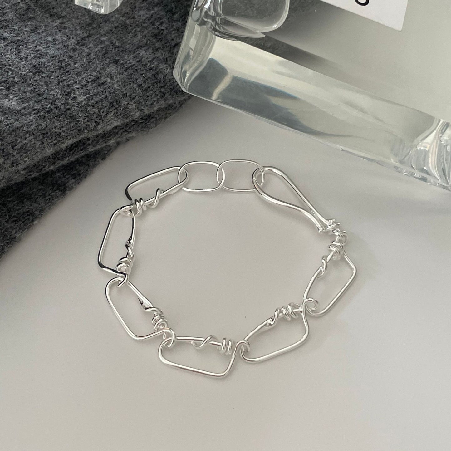 Braccialetto Minimalista a Stella Intrecciato in Argento Sterling 925 Fatto a Mano con Dettaglio Nodo
