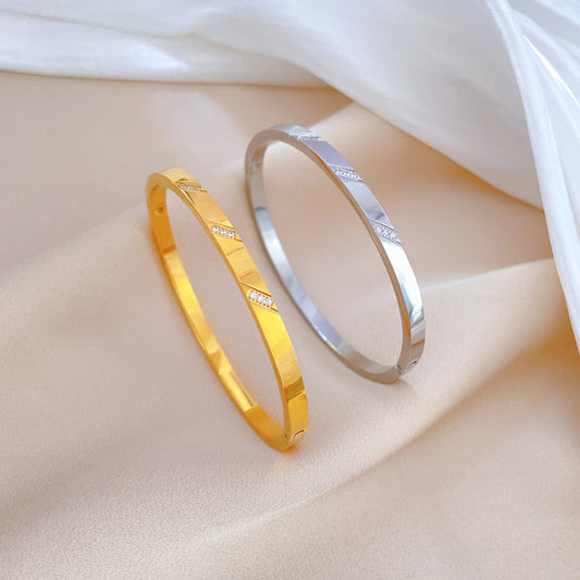 Bracciale Minimalista Etnico Vintage in Acciaio al Titanio con Conchiglie