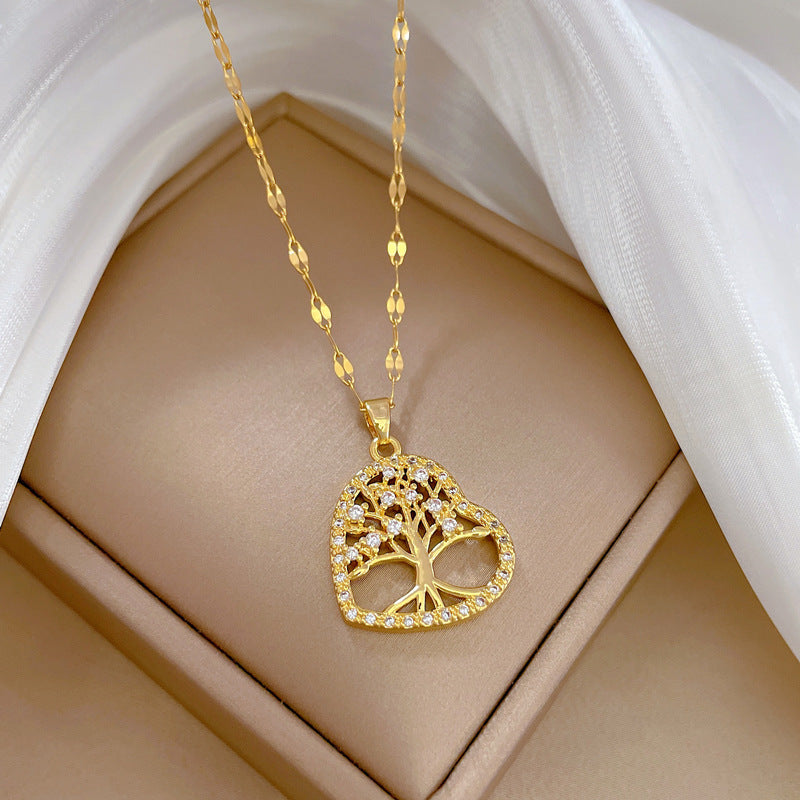 Collana con ciondolo albero della vita minimalista a forma di cuore da donna in acciaio al titanio con finitura placcata, catena sottile per clavicola