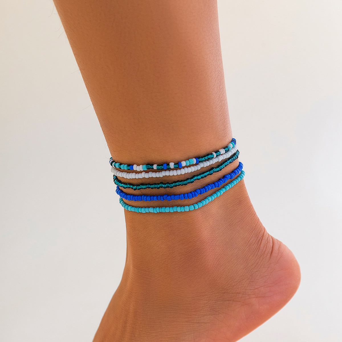 Catena elastica in vita con perline per donna in plastica con design intrecciato, catena per il ventre da spiaggia estiva