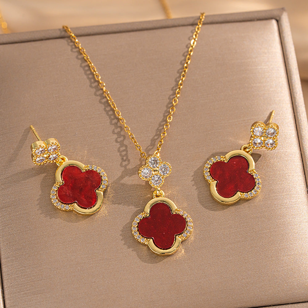 Set collana e orecchini da donna di lusso a forma di trifoglio in acciaio al titanio con intarsi in oro su catena a O