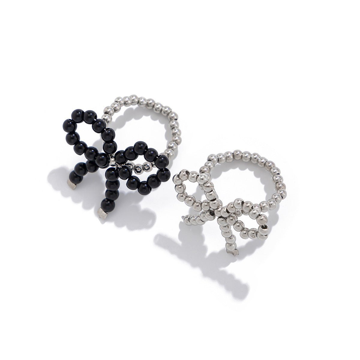 Anello in resina da donna, dolce e accattivante, a forma di fiocco, con perle e design a fascia aperta