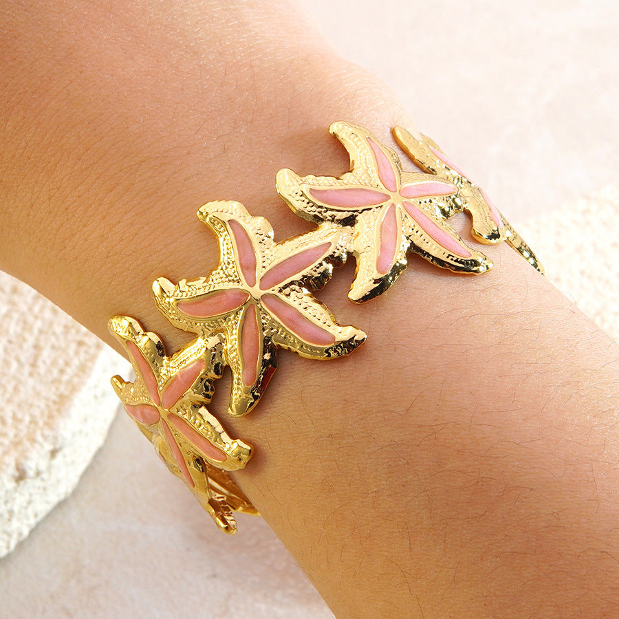 Elegante Bracciale a Polsino in Acciaio Inossidabile con Stella Marina e Goccia d'Olio