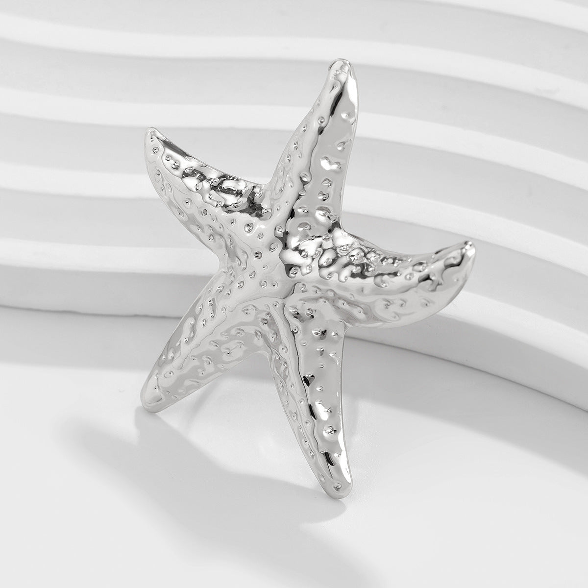 Anello da donna in metallo a forma di stella in stile vacanza con finitura placcata e fascia regolabile