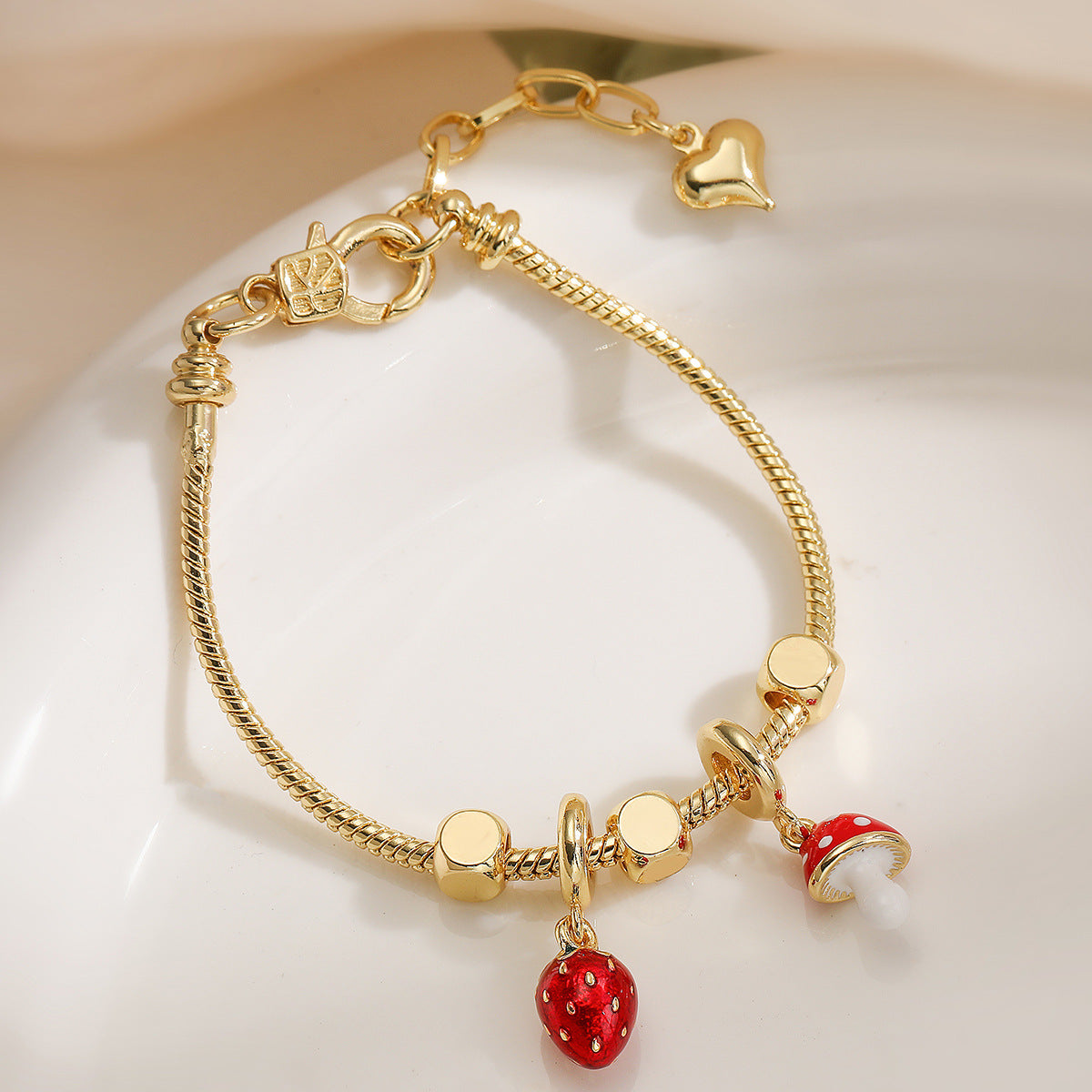 Bracciale minimalista da donna in rame a forma di aeroplano con placcatura in oro 18 carati e finitura smaltata