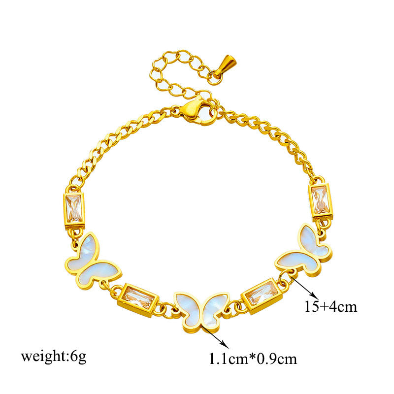 Pulsera minimalista de acero de titanio con forma de mariposa, incrustaciones de pedrería y acabado chapado para mujer