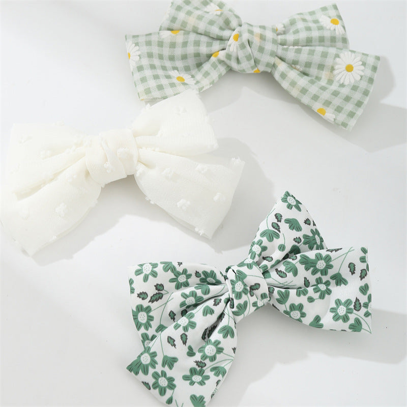 Set di fermagli per capelli minimalisti con fiocco a margherita per bambini in tessuto con palette di colori macaron e texture a maglia